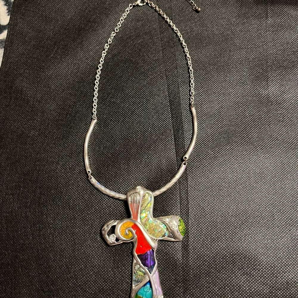 Modern EUC Silver Tone Cross Necklace with Artistic Design